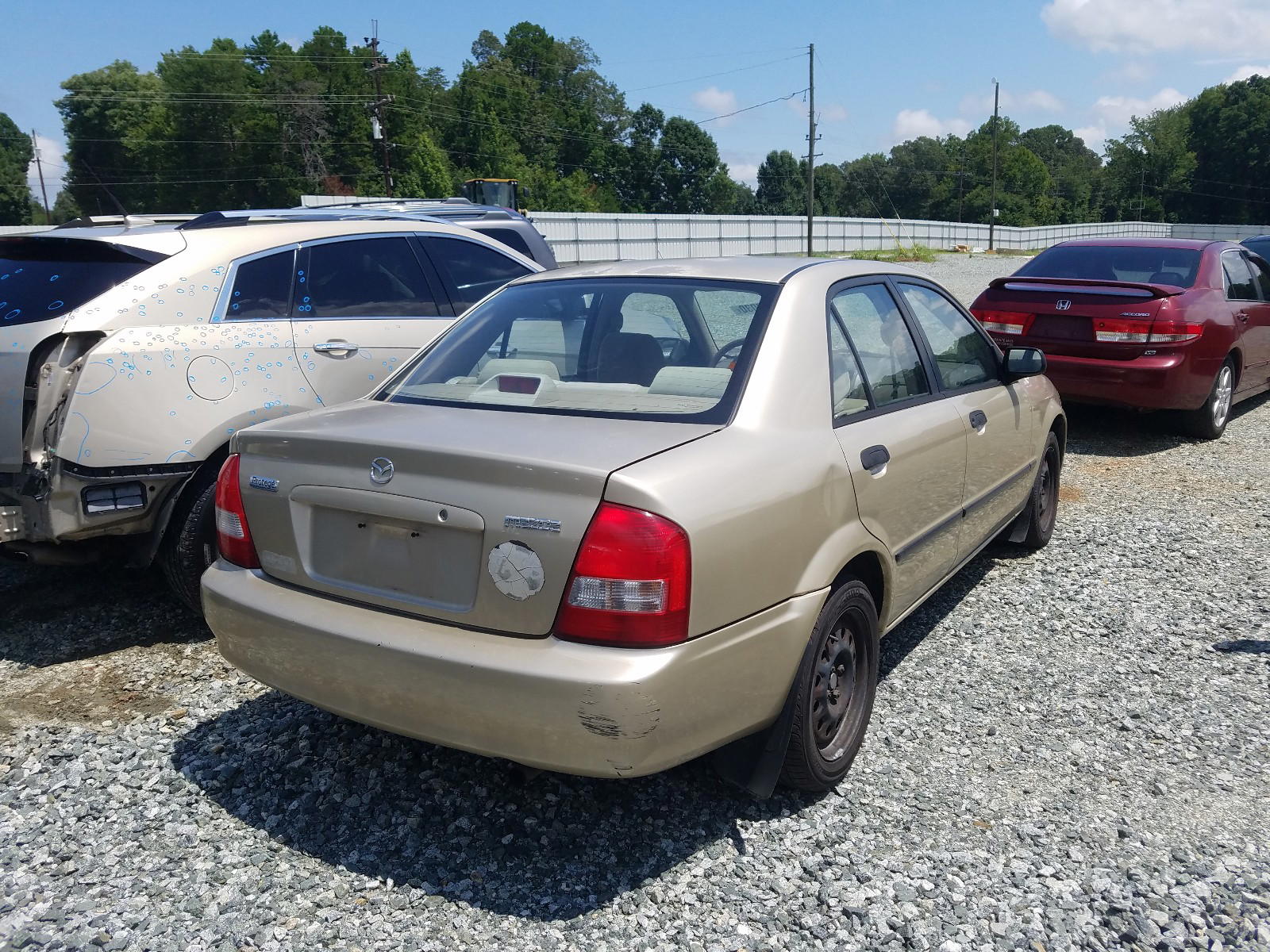 Photo 4 from auction – 2001 MAZDA PROTEGE LX with VIN JM1BJ225710435366