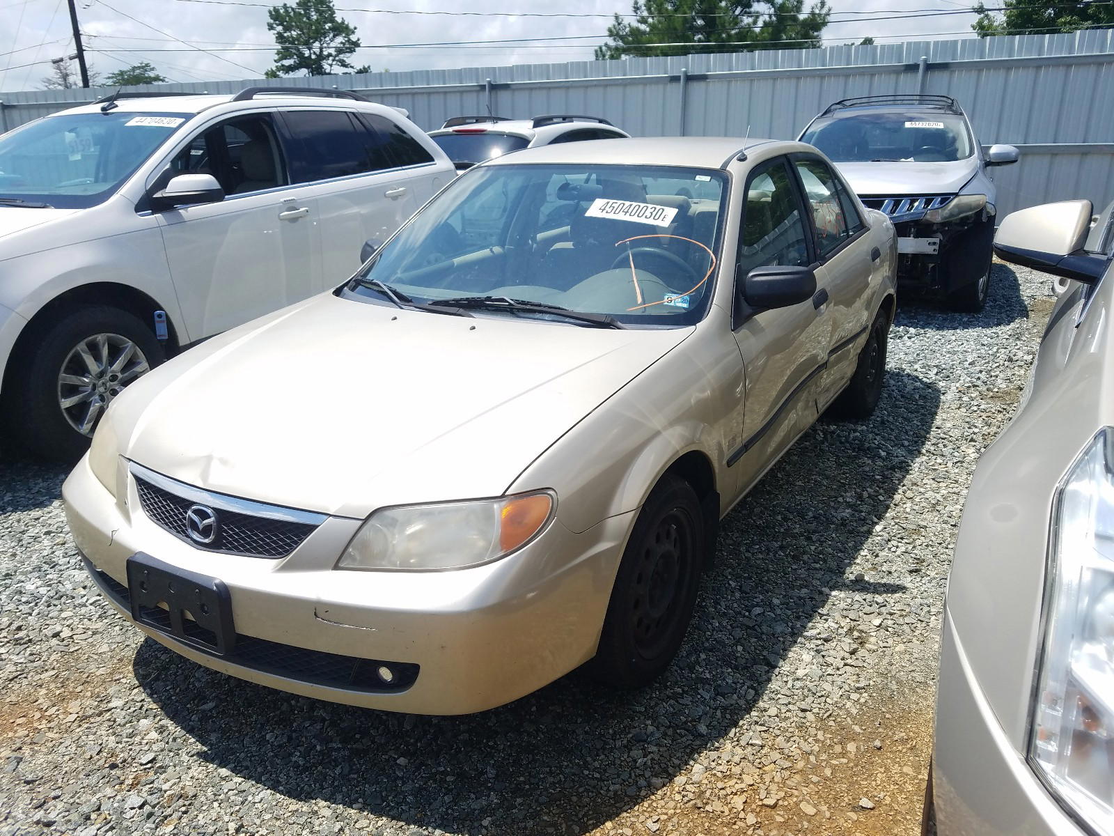 Photo 2 from auction – 2001 MAZDA PROTEGE LX with VIN JM1BJ225710435366