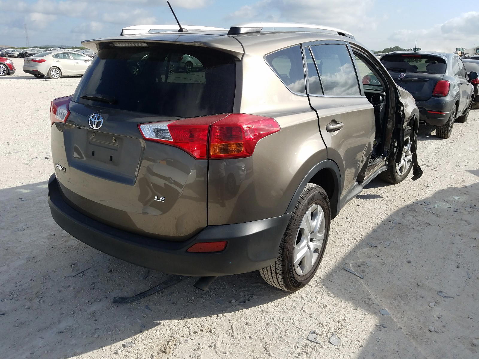 Photo 4 from auction – 2014 TOYOTA RAV4 LE with VIN JTMZFREV2ED040675