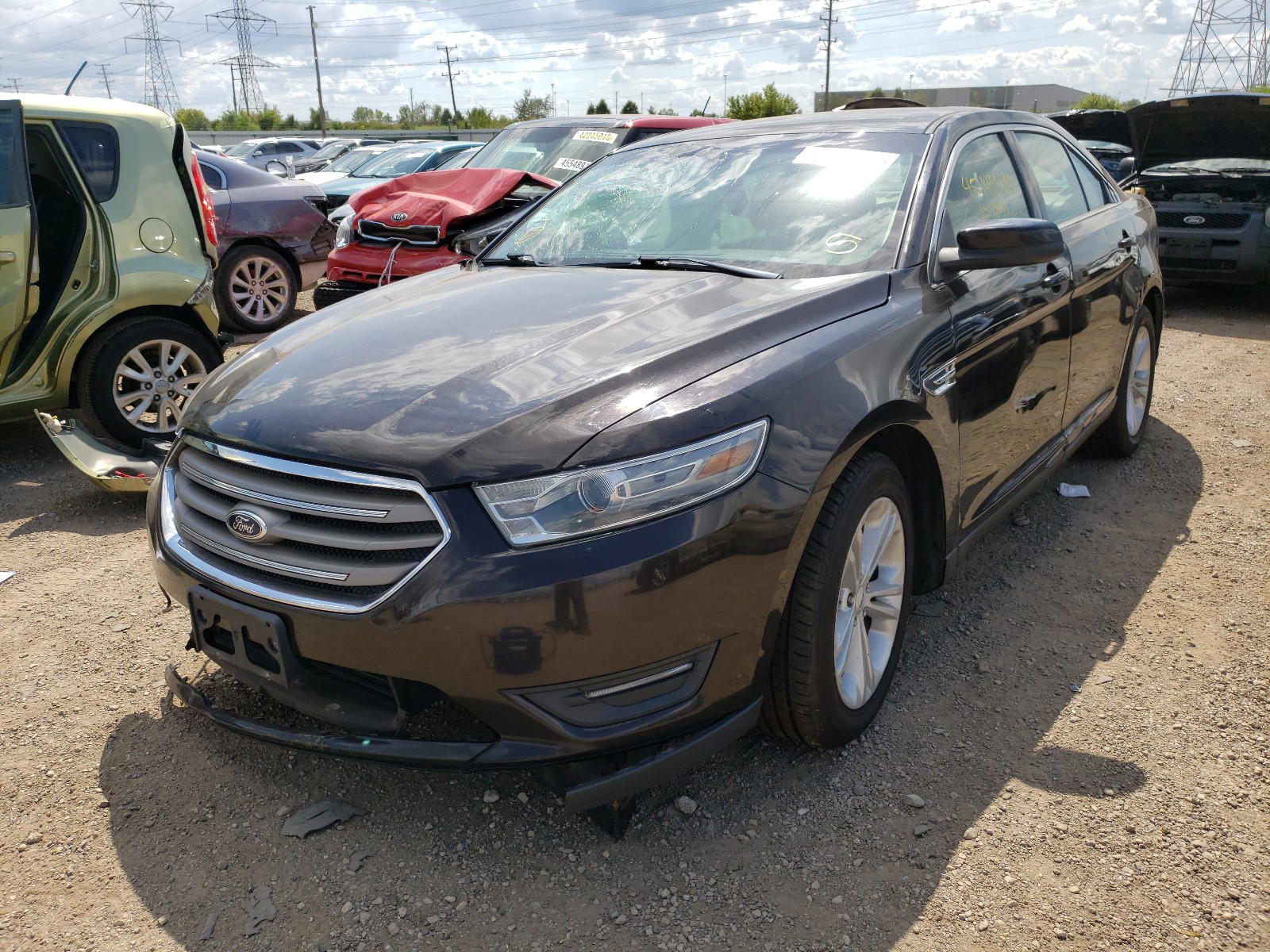 Photo 2 from auction – 2013 FORD TAURUS SEL with VIN 1FAHP2E86DG144230