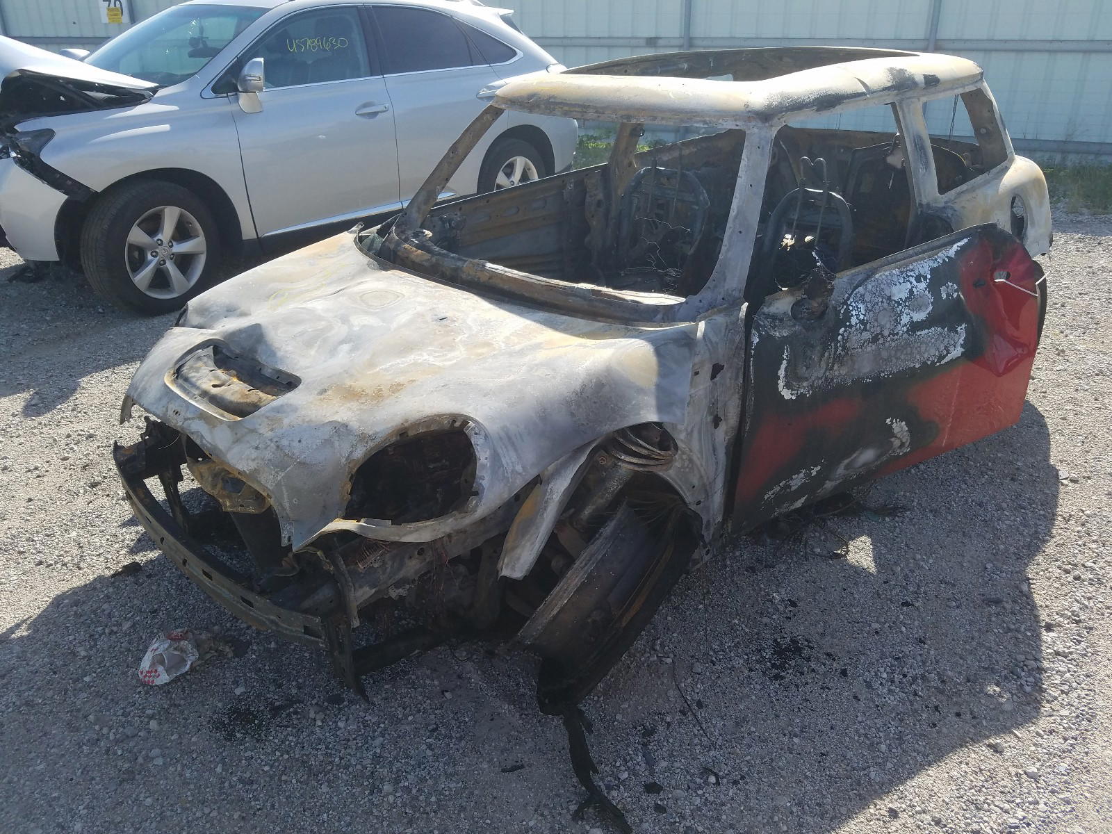 Photo 2 from auction – 2009 MINI COOPER S with VIN WMWMF73569TX40564