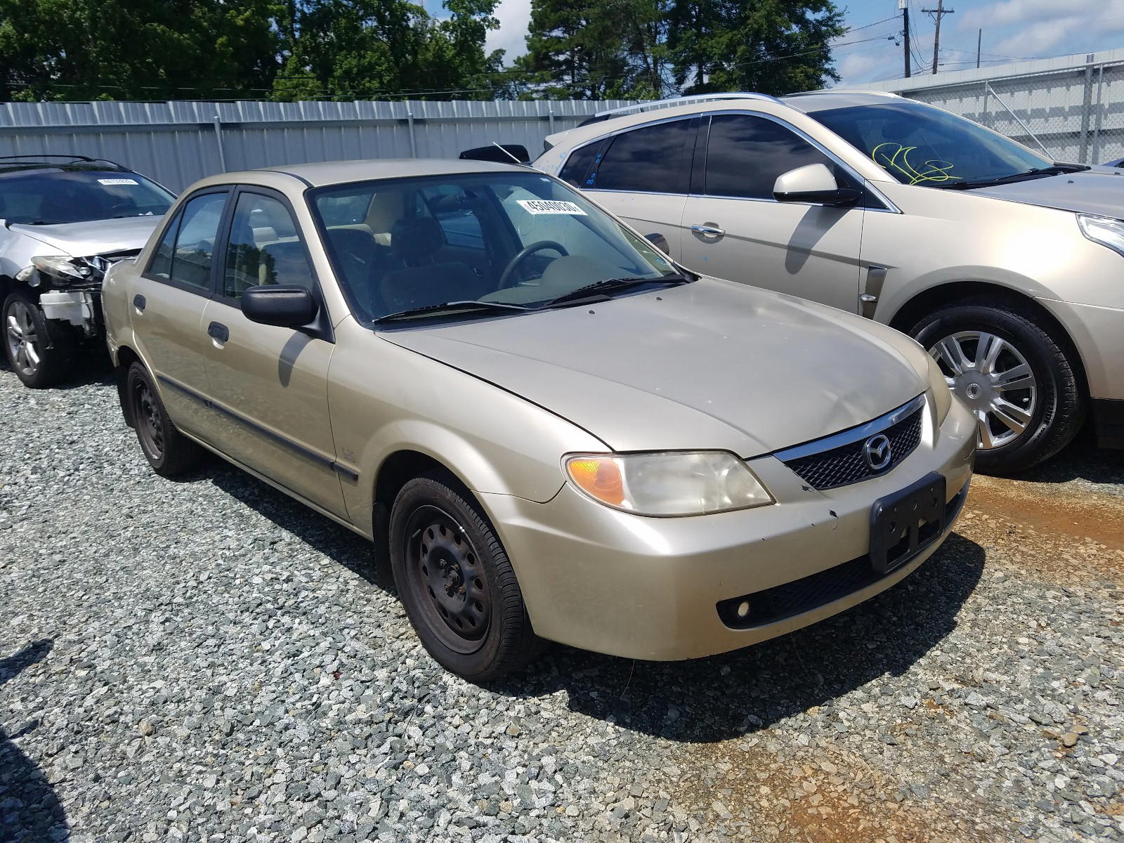 MAZDA PROTEGE LX 2001 with VIN JM1BJ225710435366 - Photo from auction