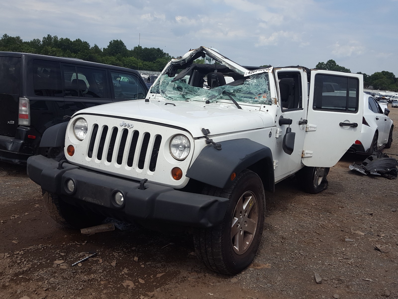 Photo 2 from auction – 2013 JEEP WRANGLER U with VIN 1C4HJWDGXDL648573