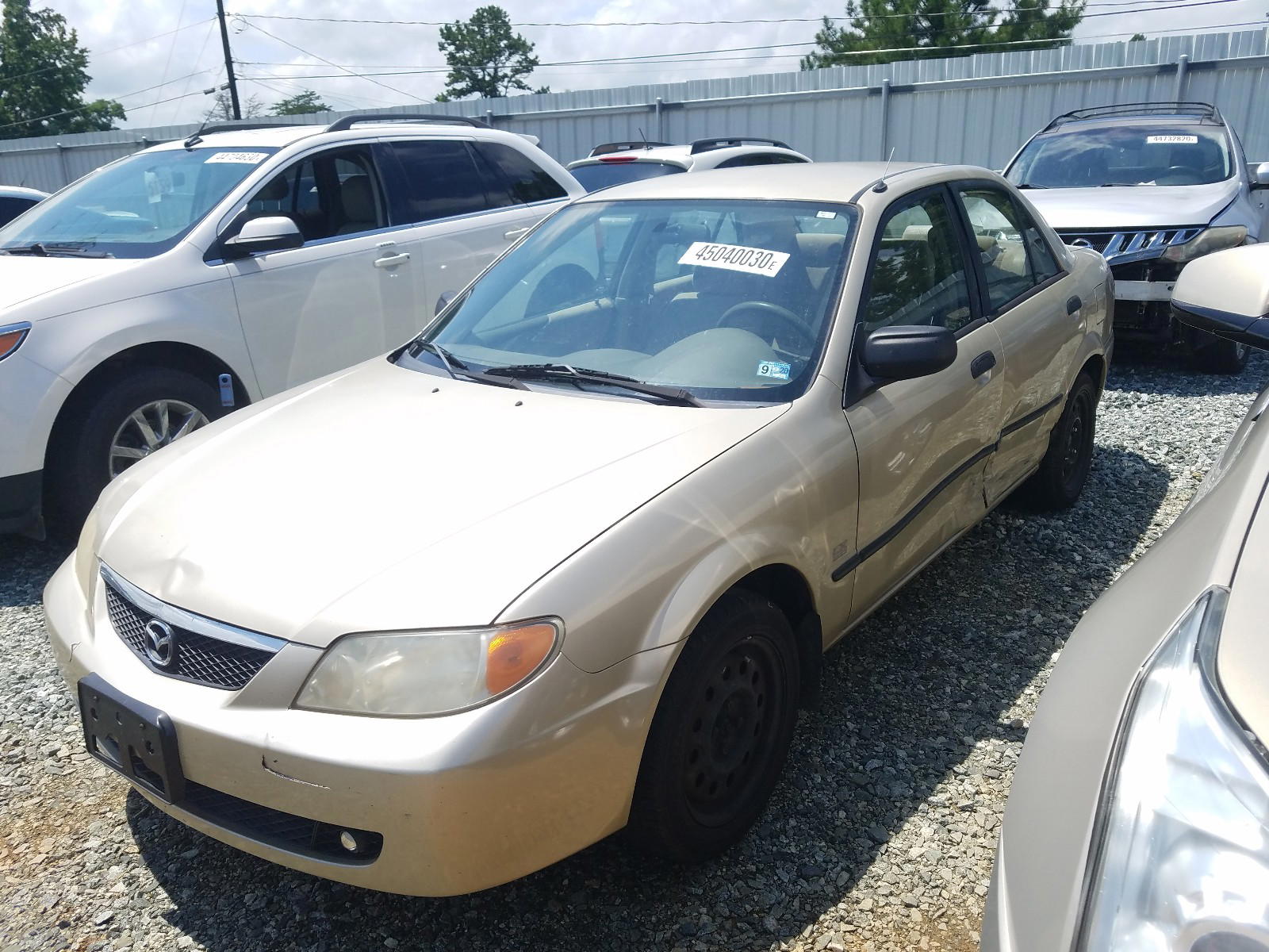Photo 9 from auction – 2001 MAZDA PROTEGE LX with VIN JM1BJ225710435366