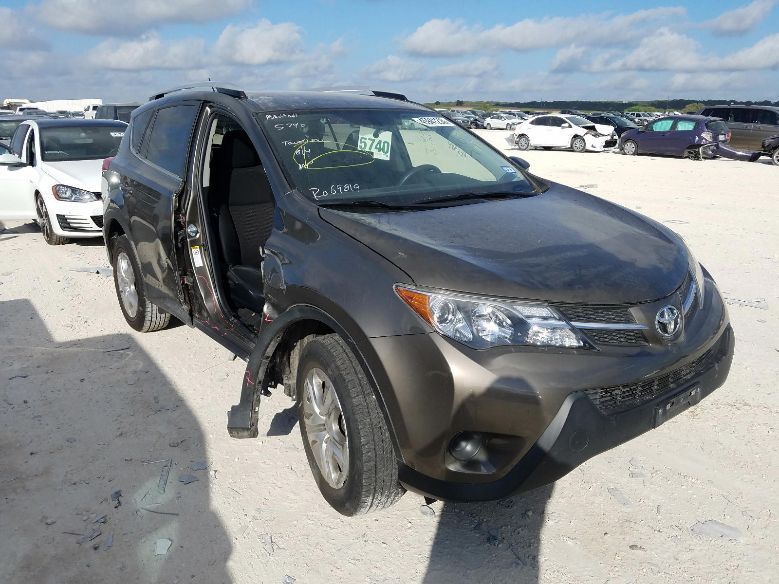 TOYOTA RAV4 LE 2014 with VIN JTMZFREV2ED040675 - Photo from auction