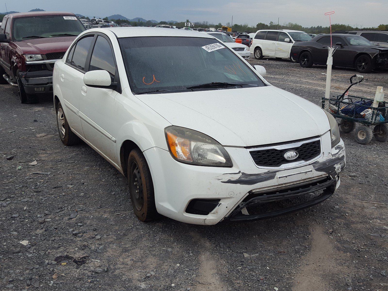 Foto 1 de la subasta – 2010 KIA RIO LX con VIN KNADH4A35A6624172