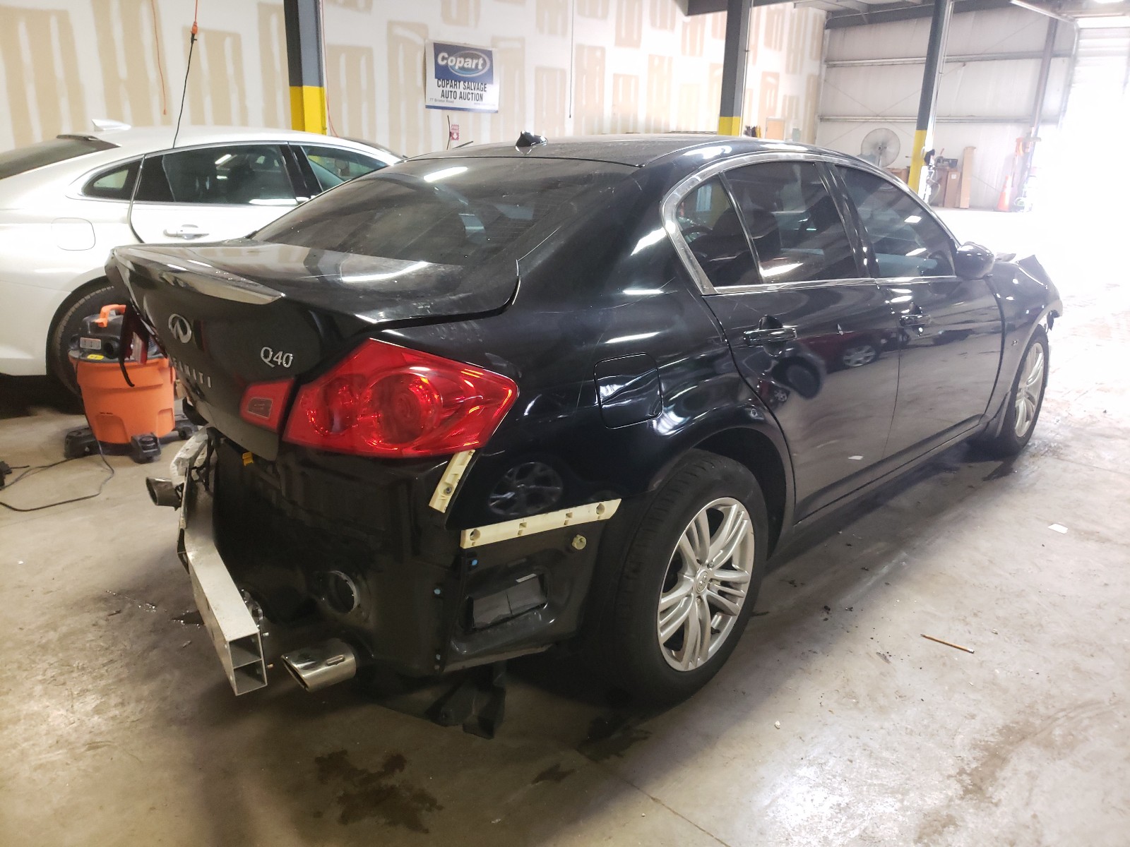 Photo 4 from auction – 2015 INFINITI Q40 with VIN JN1CV6AR7FM521574
