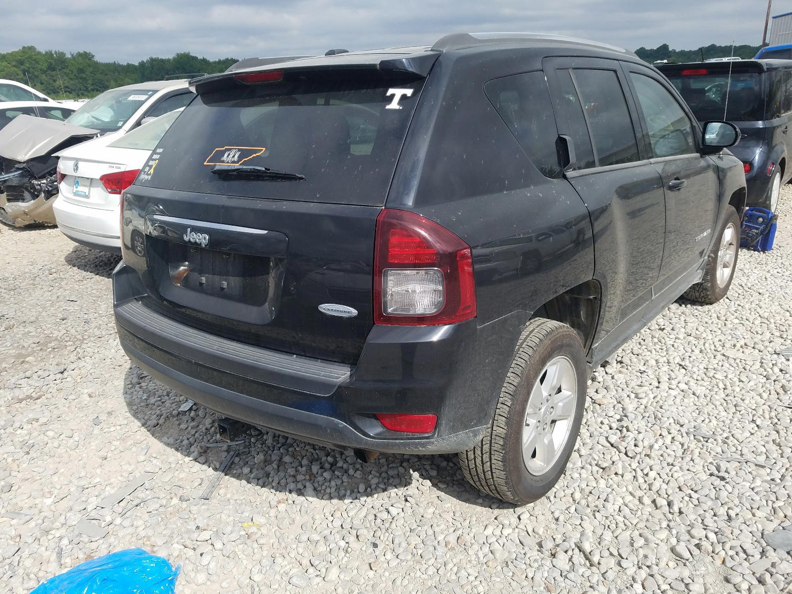 Photo 4 from auction – 2014 JEEP COMPASS LA with VIN 1C4NJCEA3ED631234