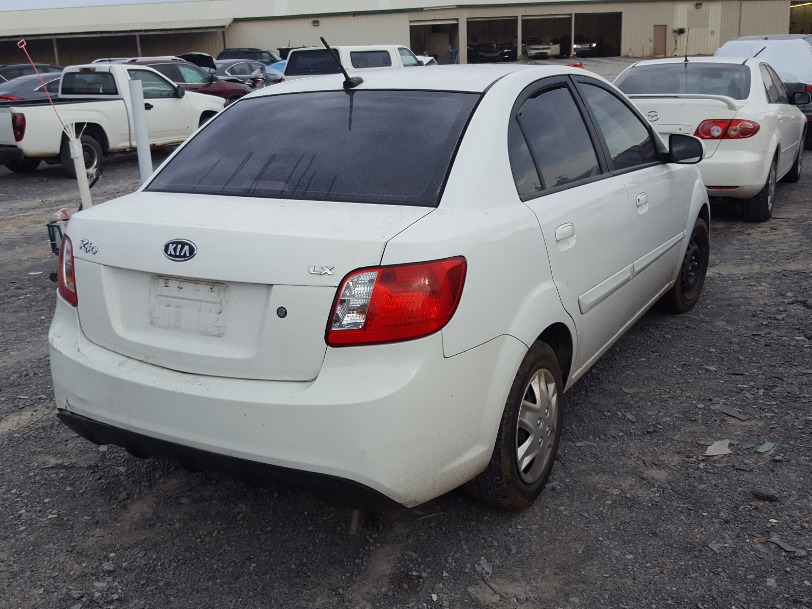 Foto 4 de la subasta – 2010 KIA RIO LX con VIN KNADH4A35A6624172