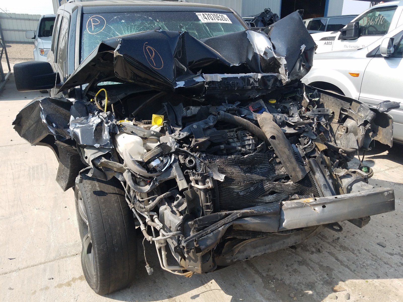 Photo 9 from auction – 2015 JEEP PATRIOT SP with VIN 1C4NJPBA1FD377455