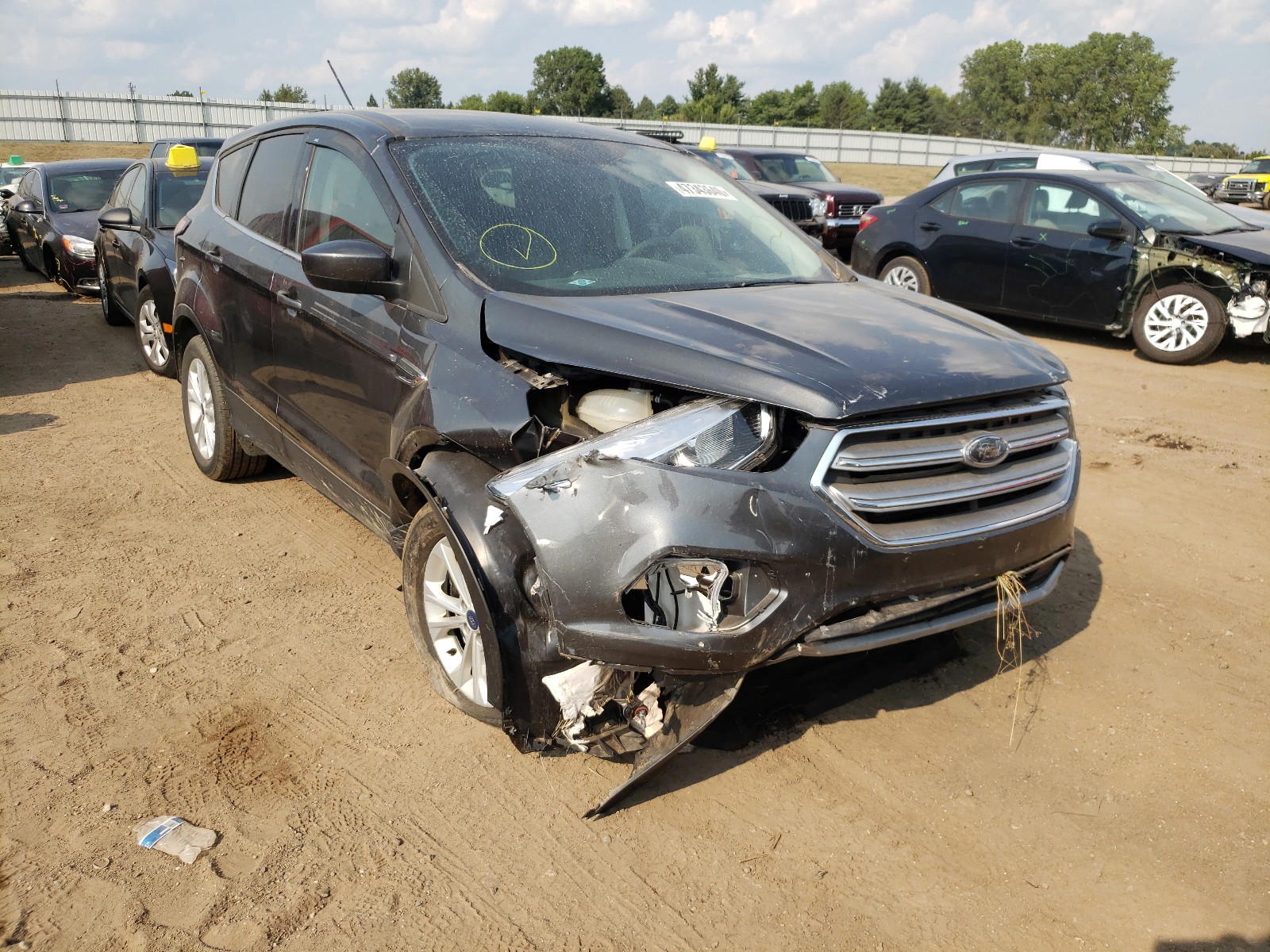 FORD ESCAPE SE 2017 with VIN 1FMCU0GD0HUE70958 - Photo from auction