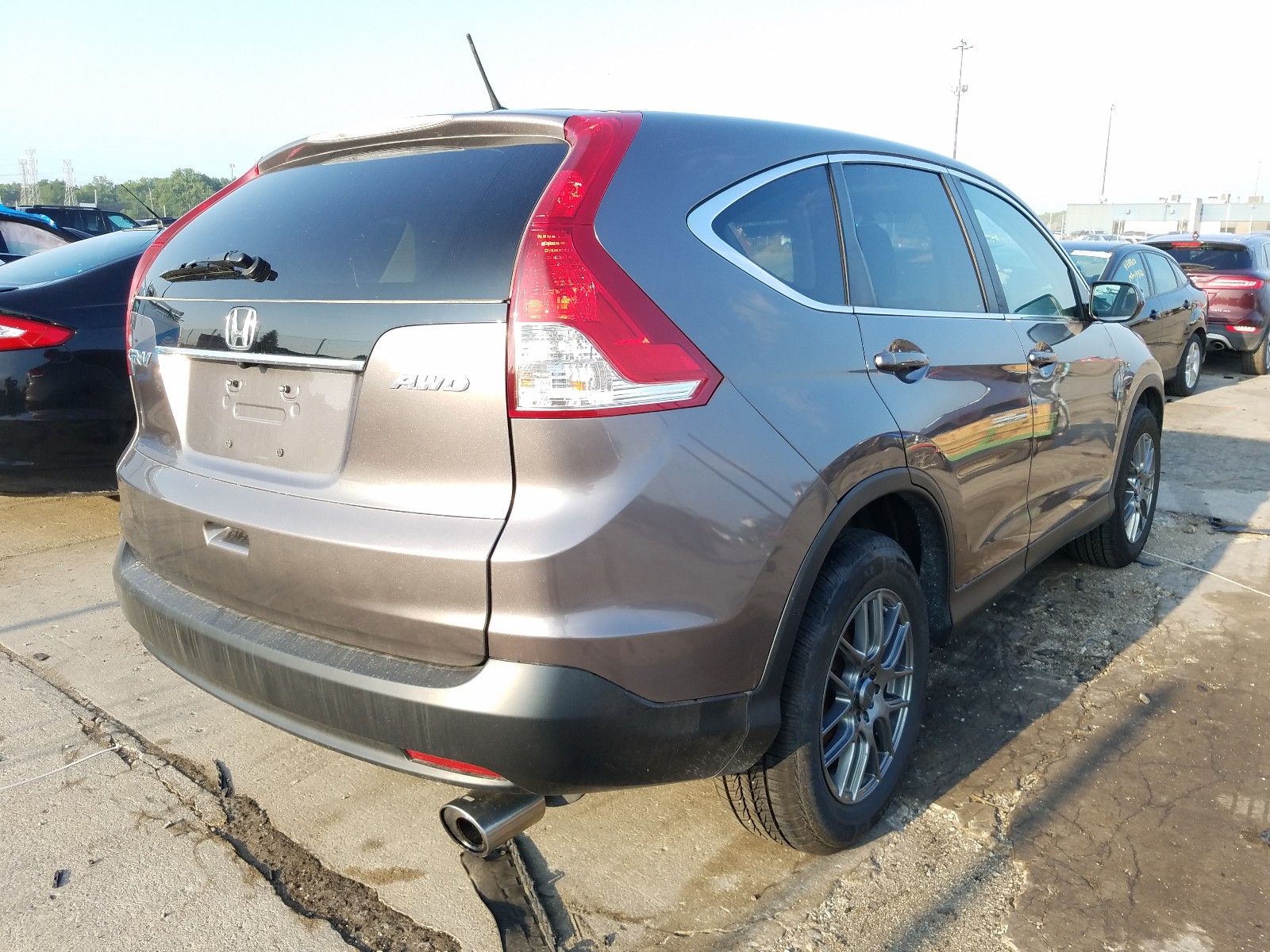 Photo 4 from auction – 2012 HONDA CR-V EX with VIN 5J6RM4H55CL020289