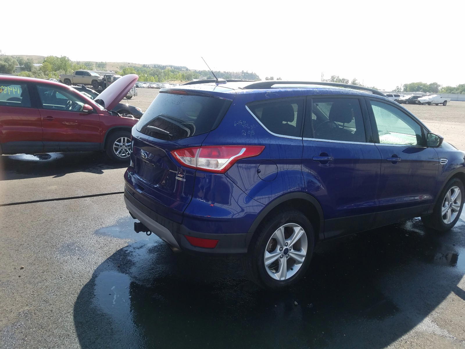Photo 4 from auction – 2014 FORD ESCAPE SE with VIN 1FMCU9G90EUB97290