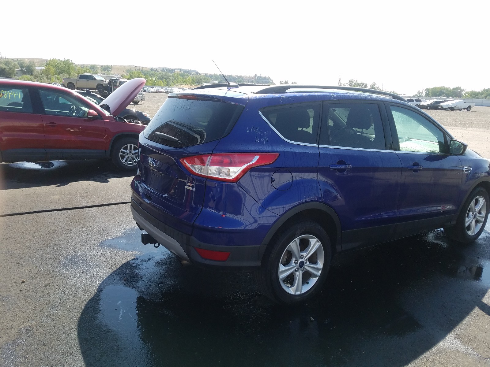 Zdjęcie 4 z aukcji – 2014 FORD ESCAPE SE z VIN 1FMCU9G90EUB97290