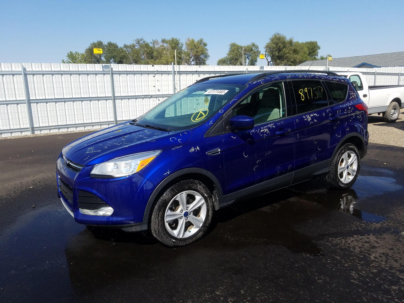 Photo 2 from auction – 2014 FORD ESCAPE SE with VIN 1FMCU9G90EUB97290