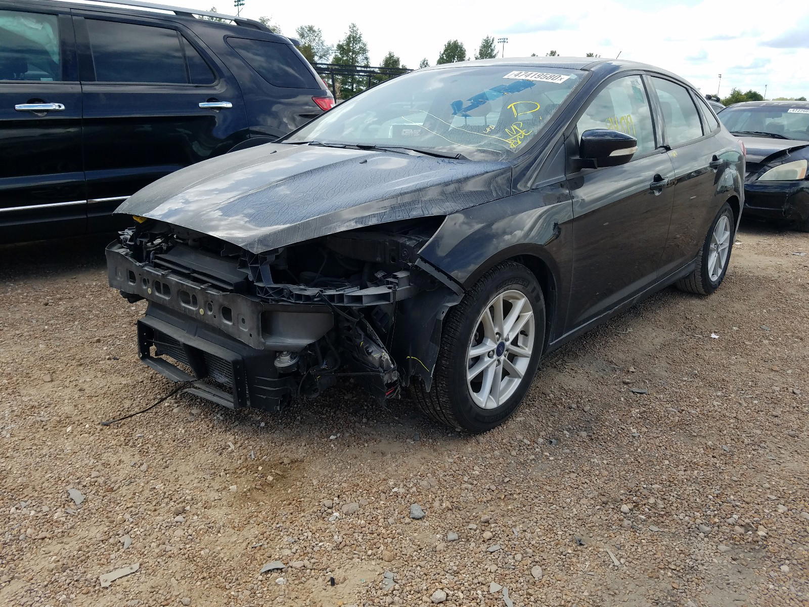 Photo 2 from auction – 2016 FORD FOCUS SE with VIN 1FADP3F29GL285920