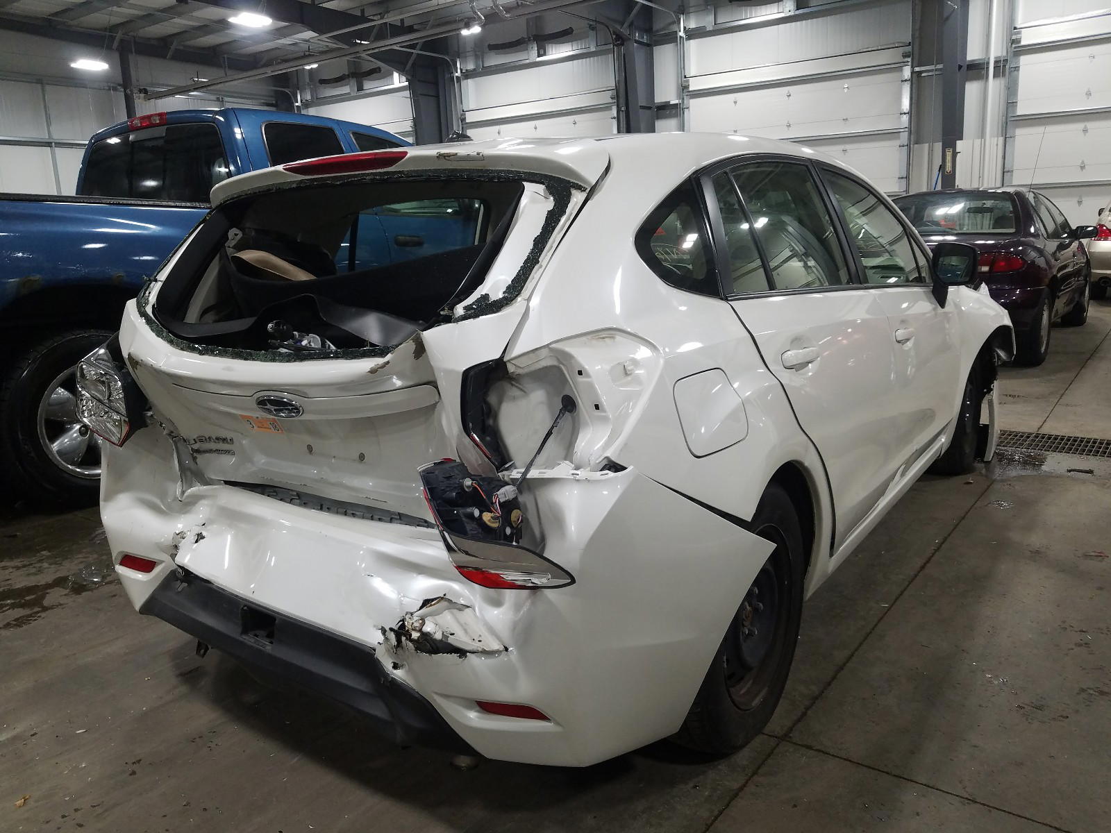 Photo 4 from auction – 2014 SUBARU IMPREZA with VIN JF1GPAA63EG285980