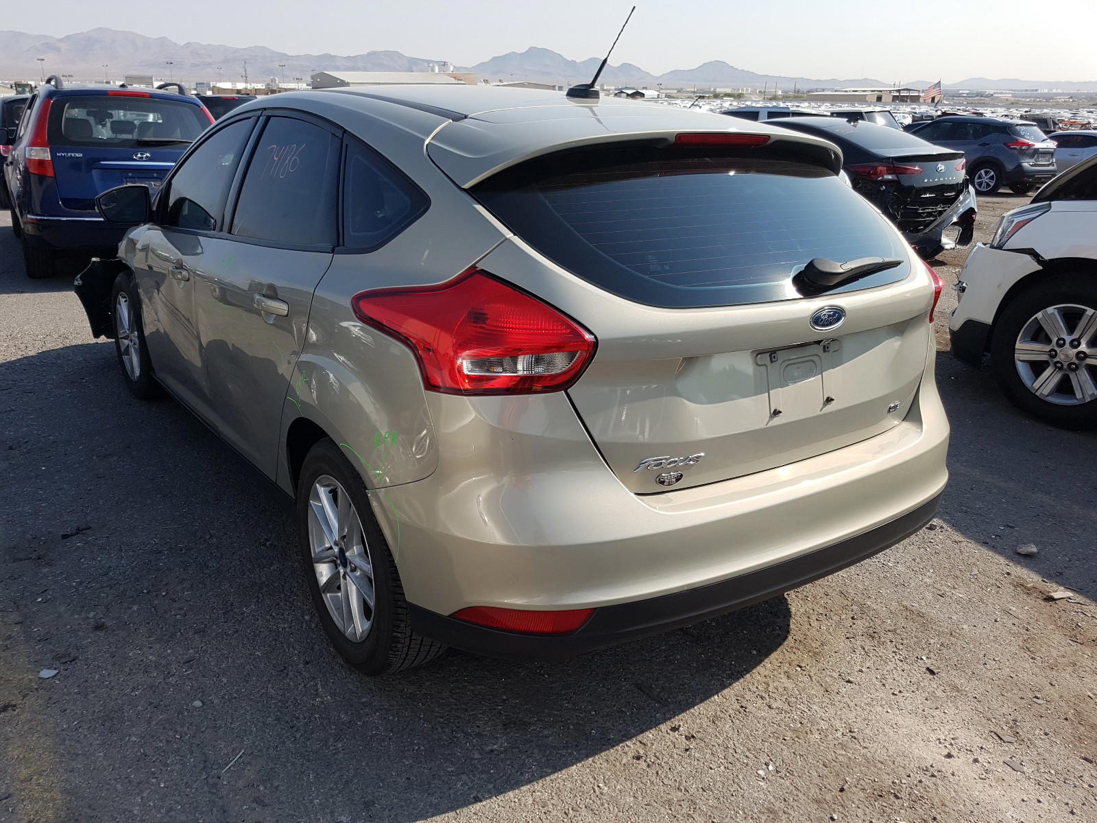 Photo 3 from auction – 2016 FORD FOCUS SE with VIN 1FADP3K23GL348029
