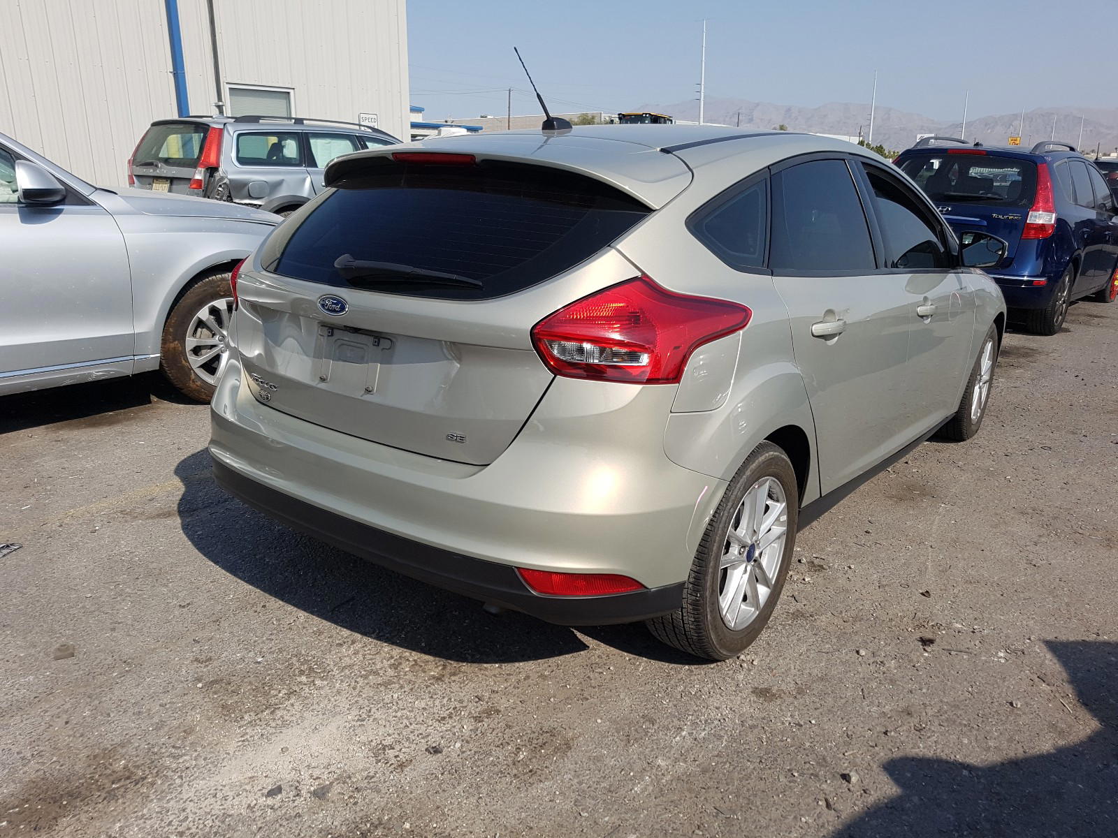Photo 4 from auction – 2016 FORD FOCUS SE with VIN 1FADP3K23GL348029