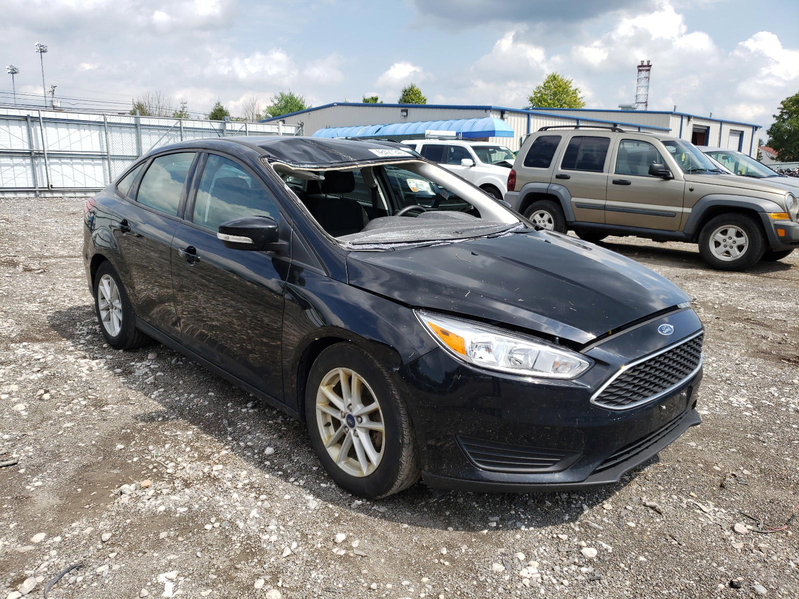 FORD FOCUS SE 2018 with VIN 1FADP3F27JL214979 - Photo from auction