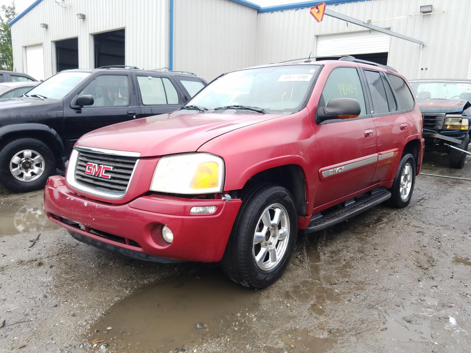 Photo 12 from auction – 2004 GMC ENVOY with VIN 1GKDS13S042424162