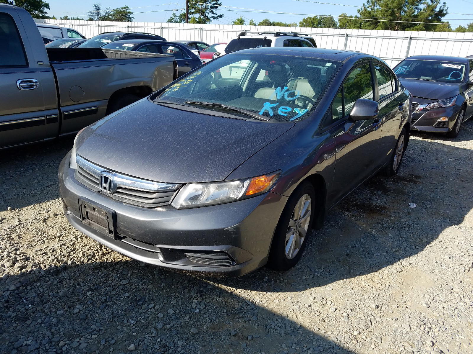Photo 2 from auction – 2012 HONDA CIVIC EXL with VIN 19XFB2F95CE010718