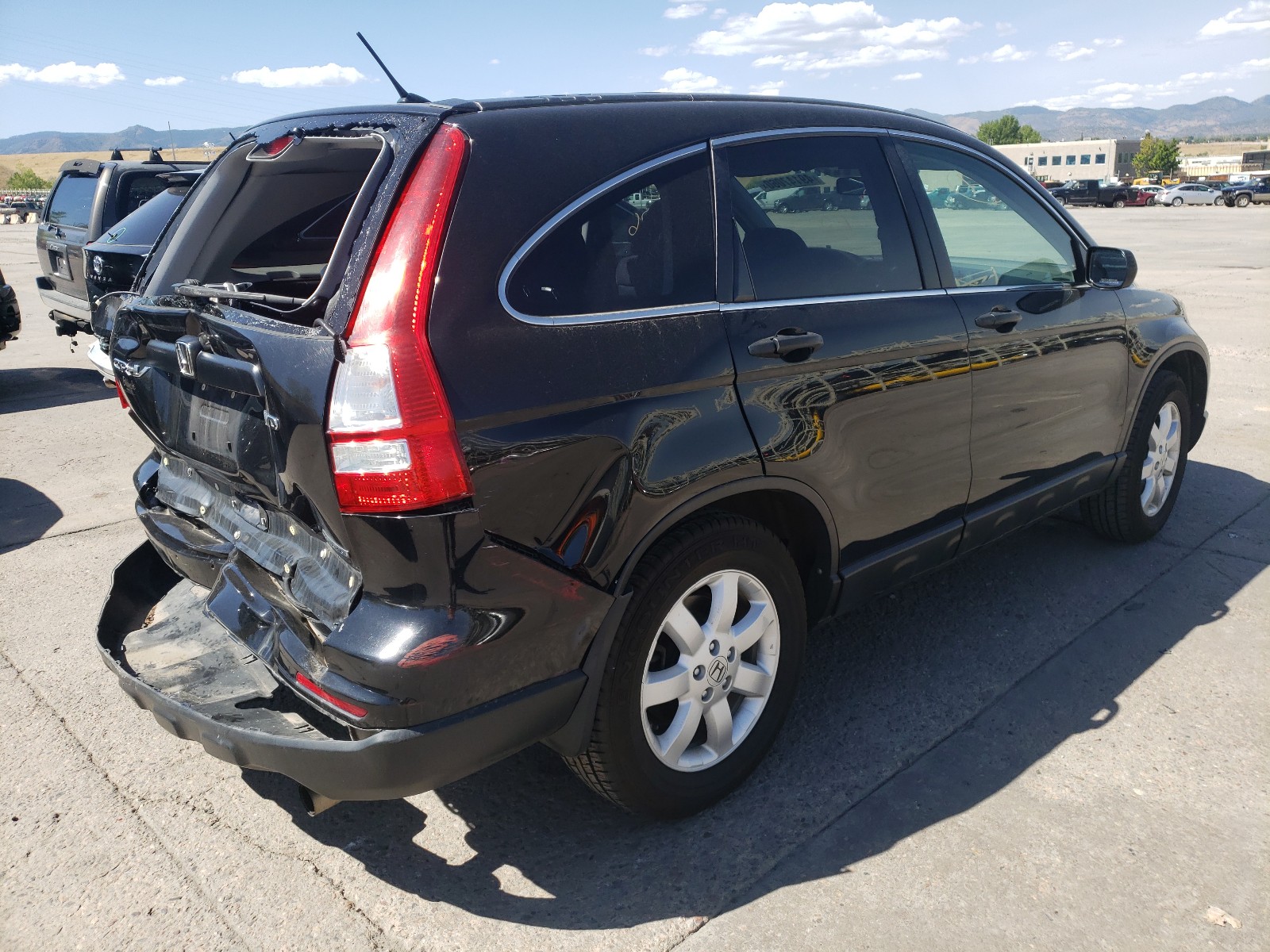 Photo 4 from auction – 2011 HONDA CR-V SE with VIN 5J6RE4H42BL103391