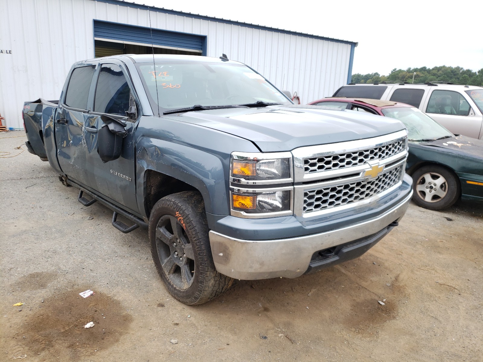 CHEVROLET SILVERADO 2014 with VIN 3GCUKREC9EG502916 - Photo from auction