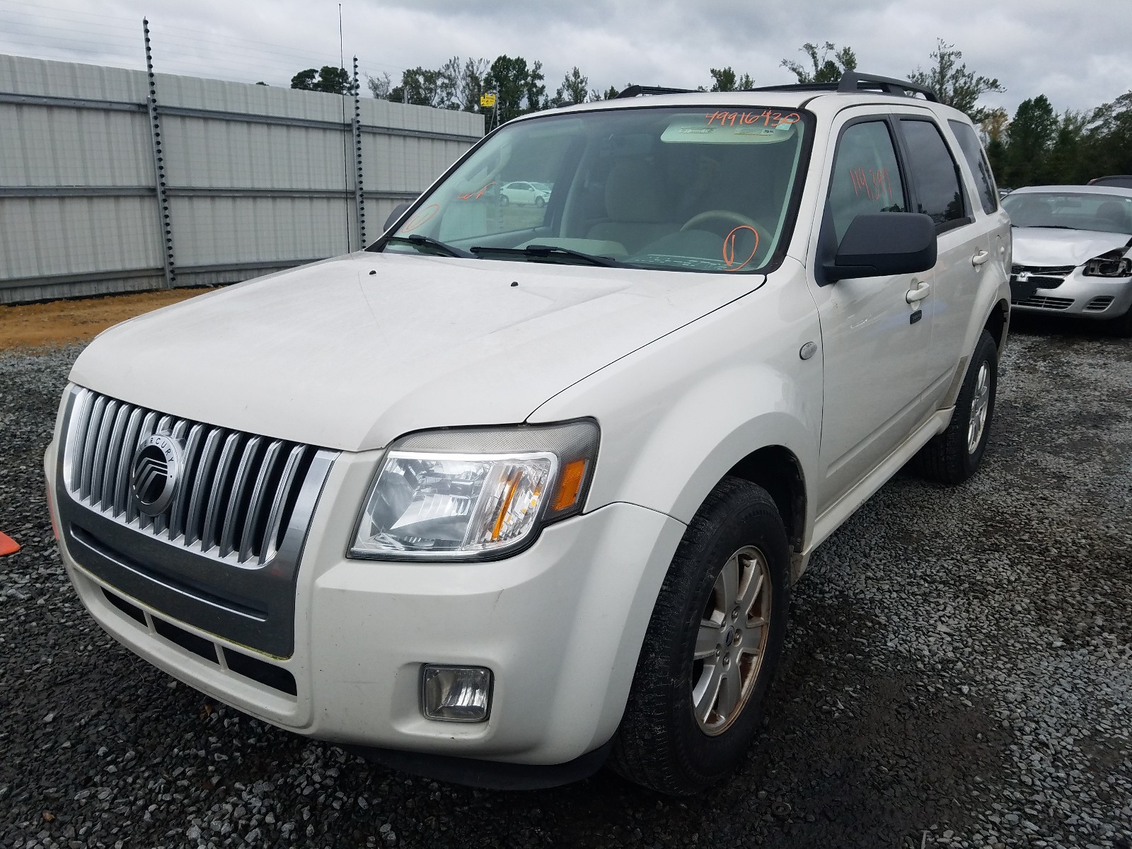 Photo 2 from auction – 2009 MERCURY MARINER with VIN 4M2CU81G69KJ03382