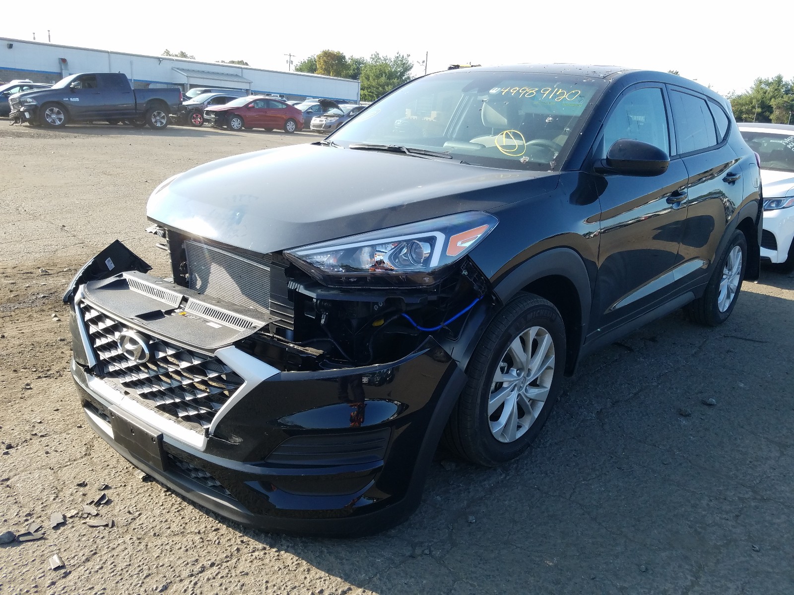Photo 2 from auction – 2020 HYUNDAI TUCSON SE with VIN KM8J2CA45LU156755