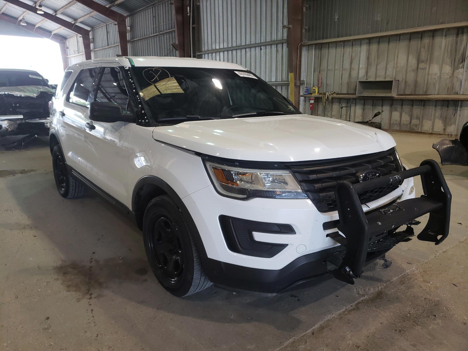 FORD EXPLORER P 2017 with VIN 1FM5K8AR4HGA79487 - Photo from auction