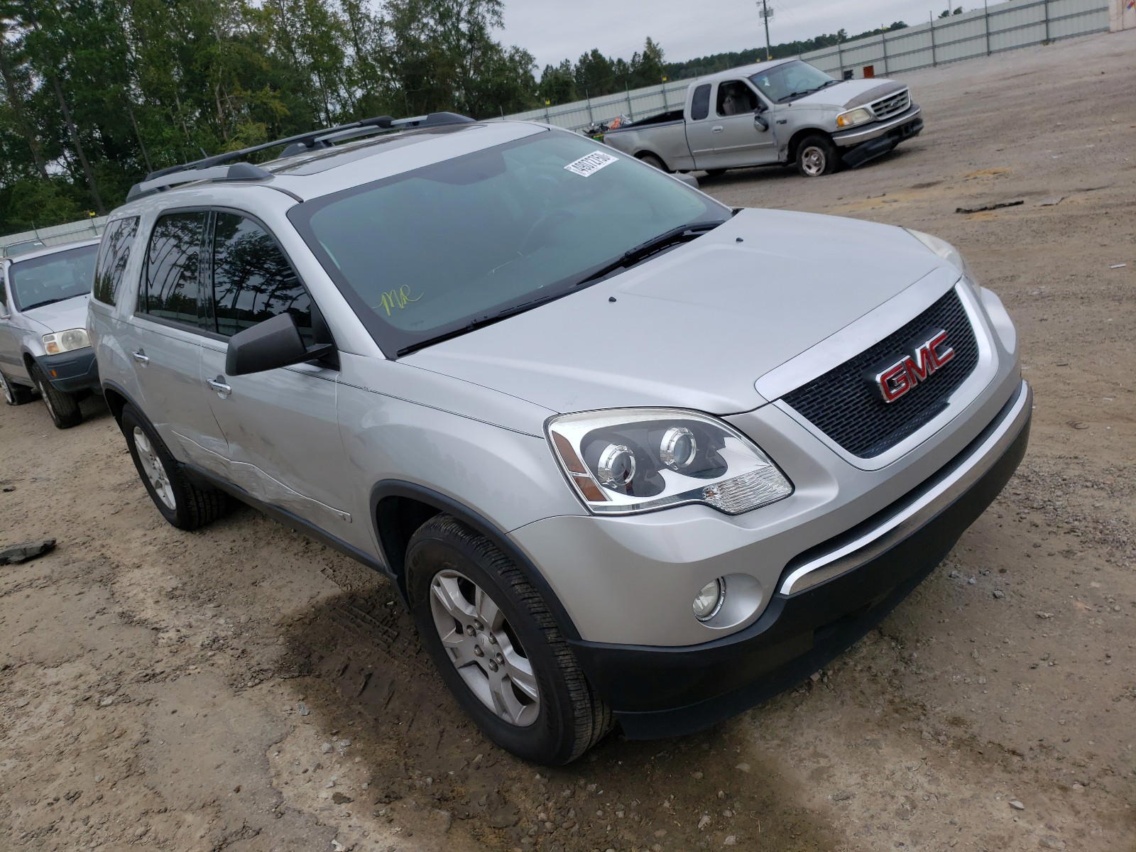 GMC ACADIA SLE 2010 with VIN 1GKLRLED7AJ145617 - Photo from auction