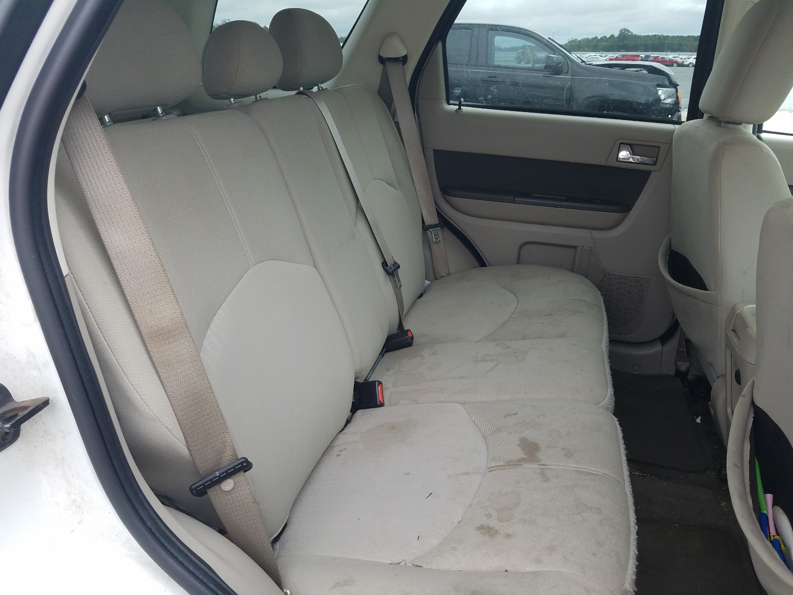 Photo 6 from auction – 2009 MERCURY MARINER with VIN 4M2CU81G69KJ03382