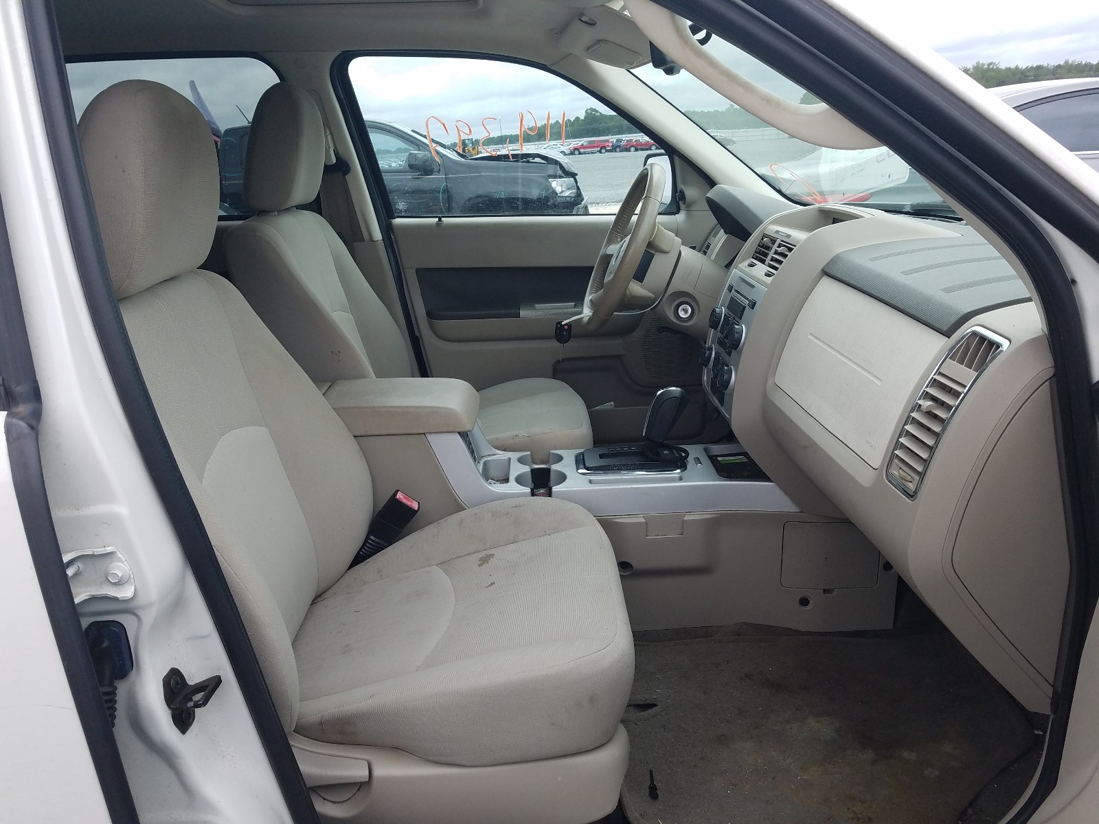 Photo 5 from auction – 2009 MERCURY MARINER with VIN 4M2CU81G69KJ03382