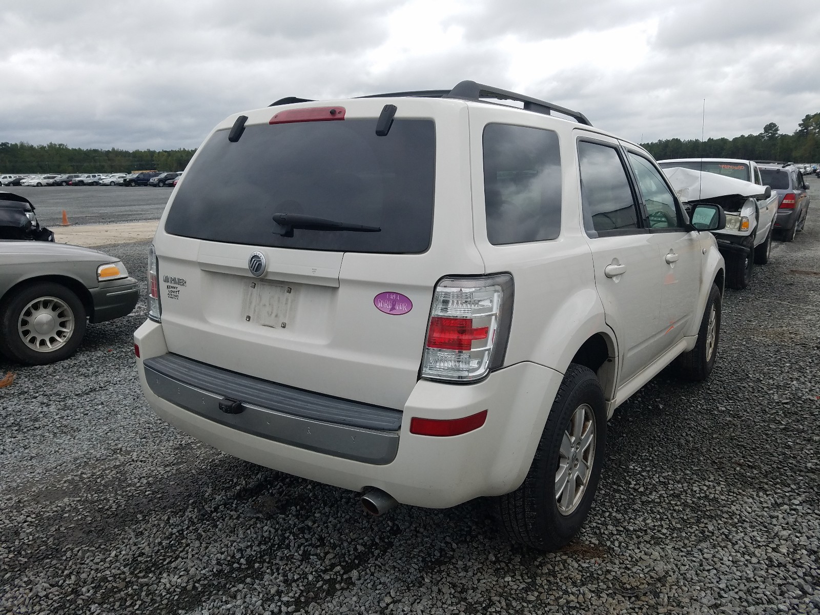 Photo 4 from auction – 2009 MERCURY MARINER with VIN 4M2CU81G69KJ03382