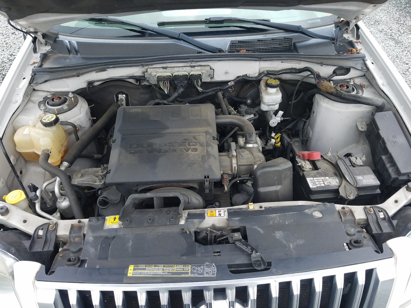Photo 7 from auction – 2009 MERCURY MARINER with VIN 4M2CU81G69KJ03382