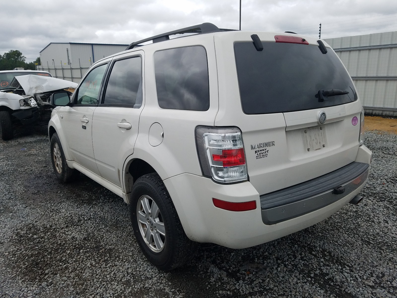 Photo 3 from auction – 2009 MERCURY MARINER with VIN 4M2CU81G69KJ03382
