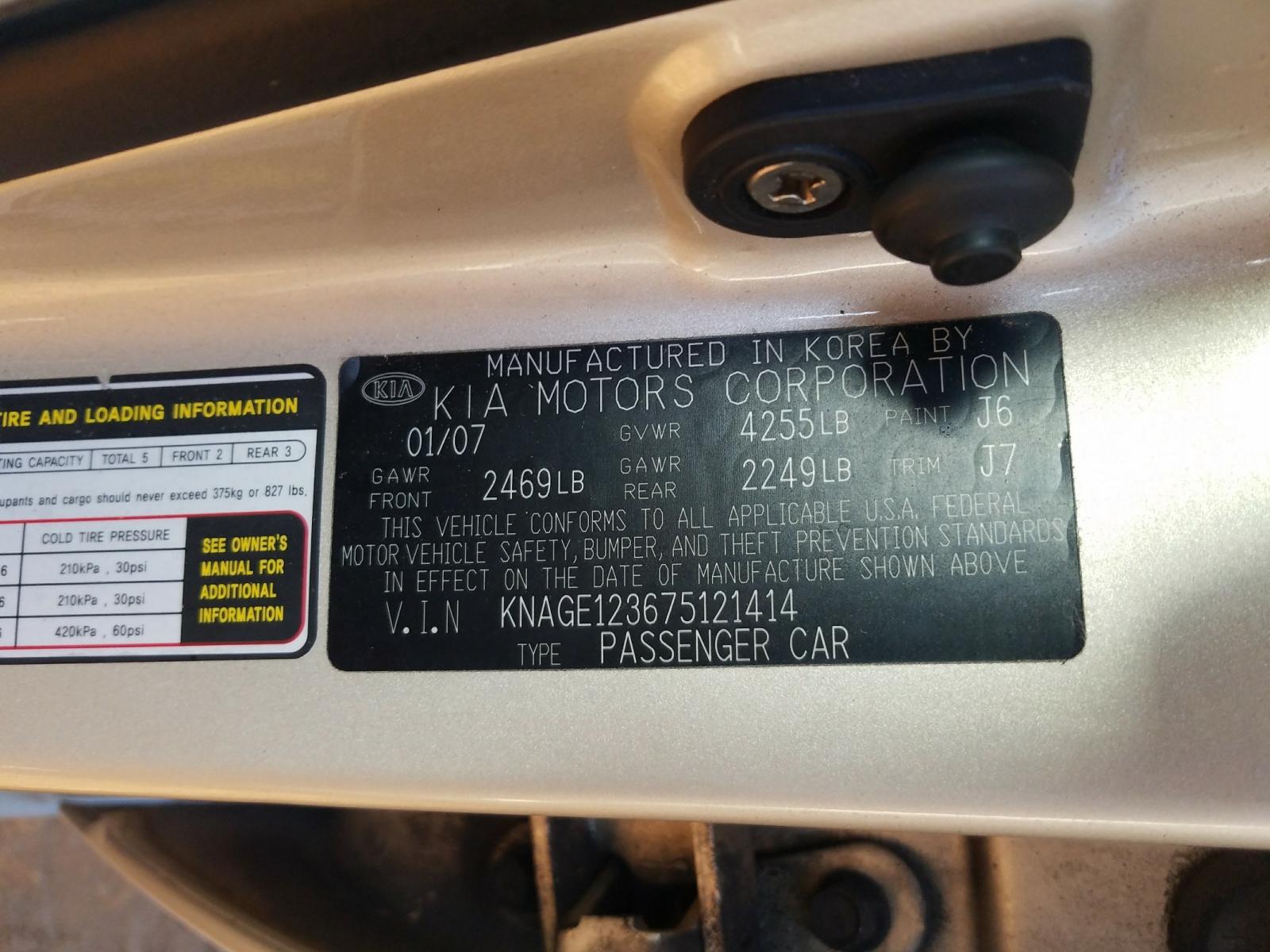 Photo 10 from auction – 2007 KIA OPTIMA LX with VIN KNAGE123675121414