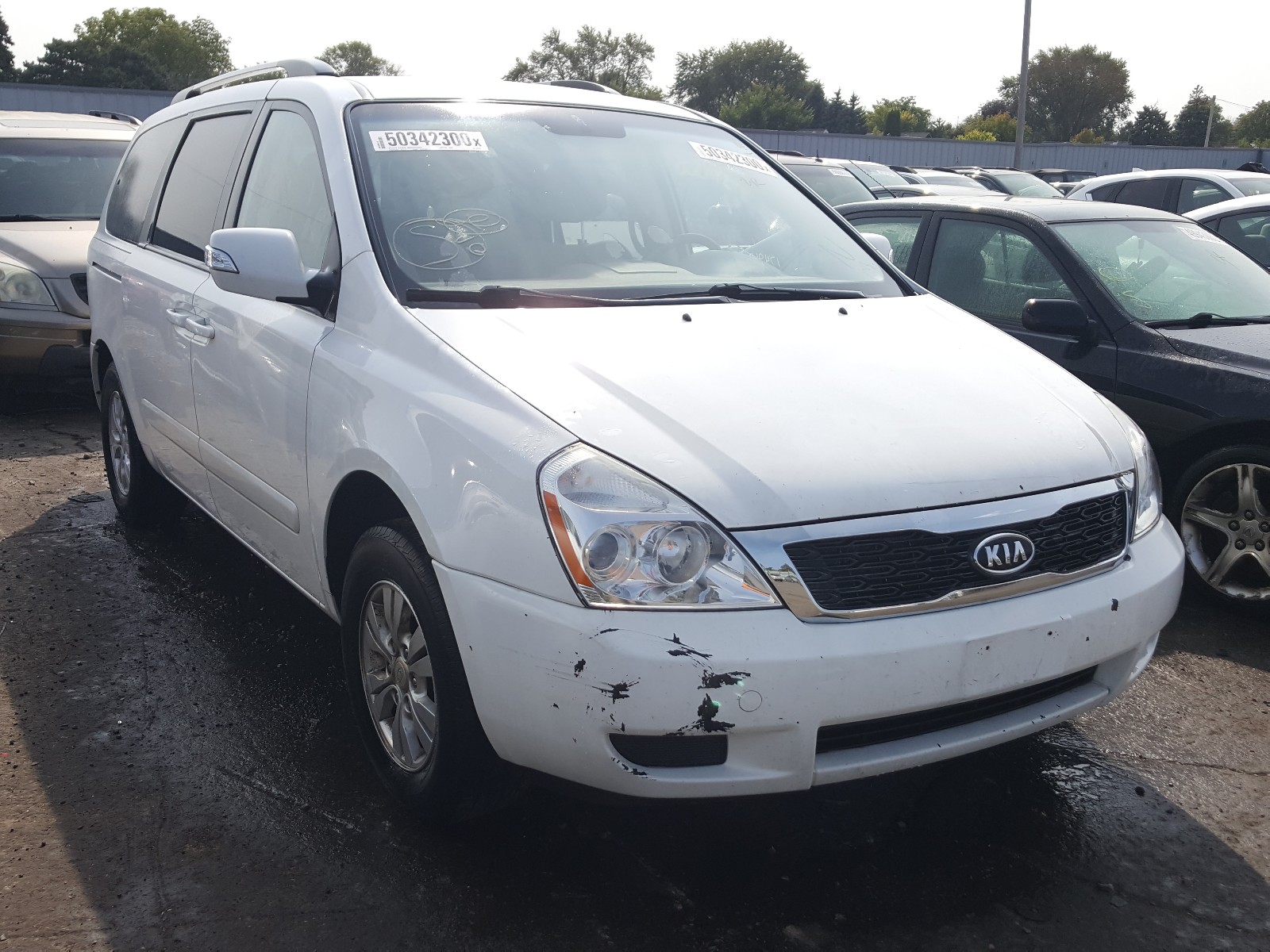 KIA SEDONA LX 2012 with VIN KNDMG4C75C6442142 - Photo from auction