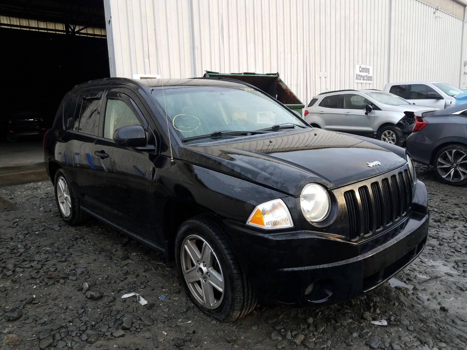 JEEP COMPASS 2007 with VIN 1J8FF47W97D597669 - Photo from auction