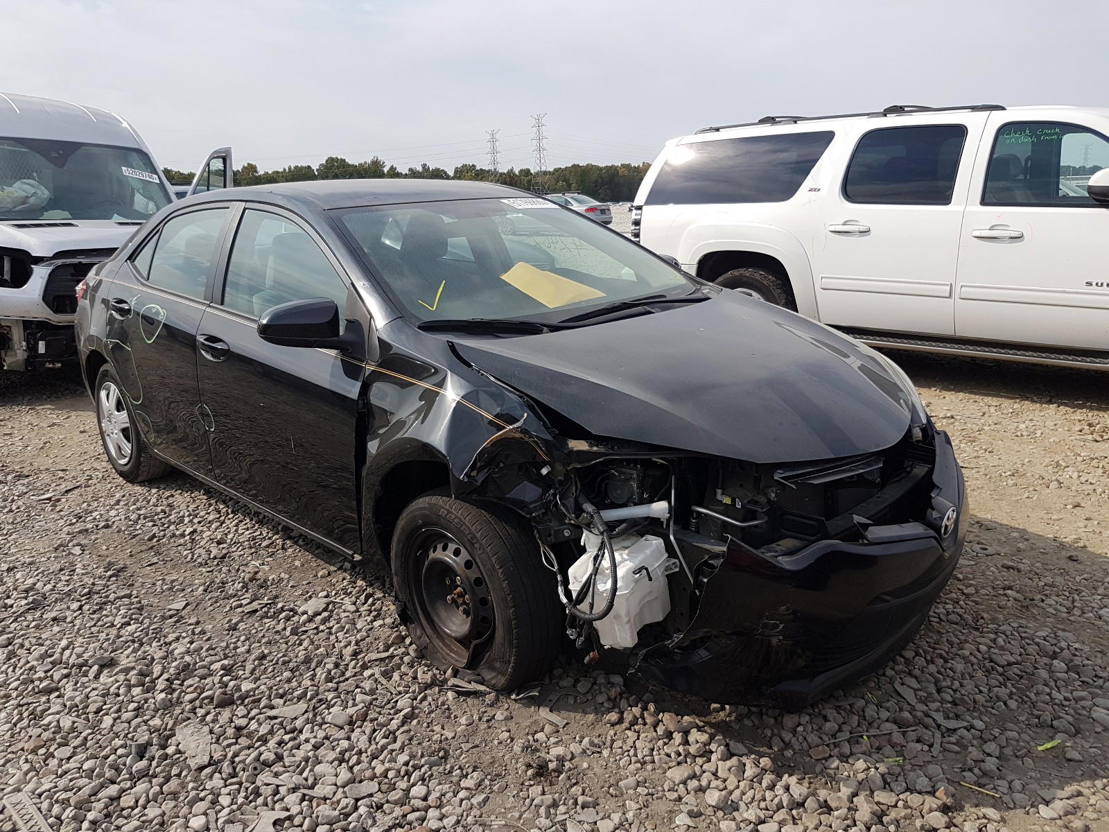 TOYOTA COROLLA L 2015 with VIN 5YFBURHE2FP216951 - Photo from auction