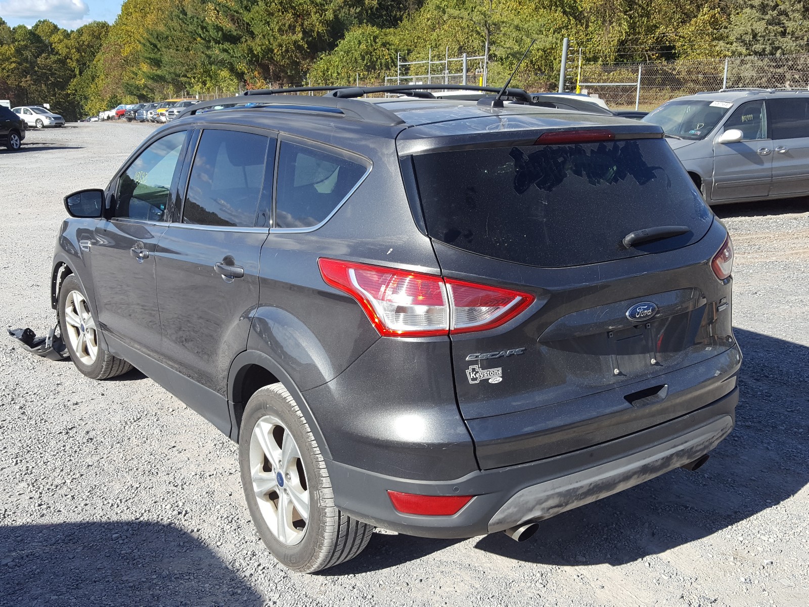 Photo 3 from auction – 2016 FORD ESCAPE SE with VIN 1FMCU9GX4GUA58023