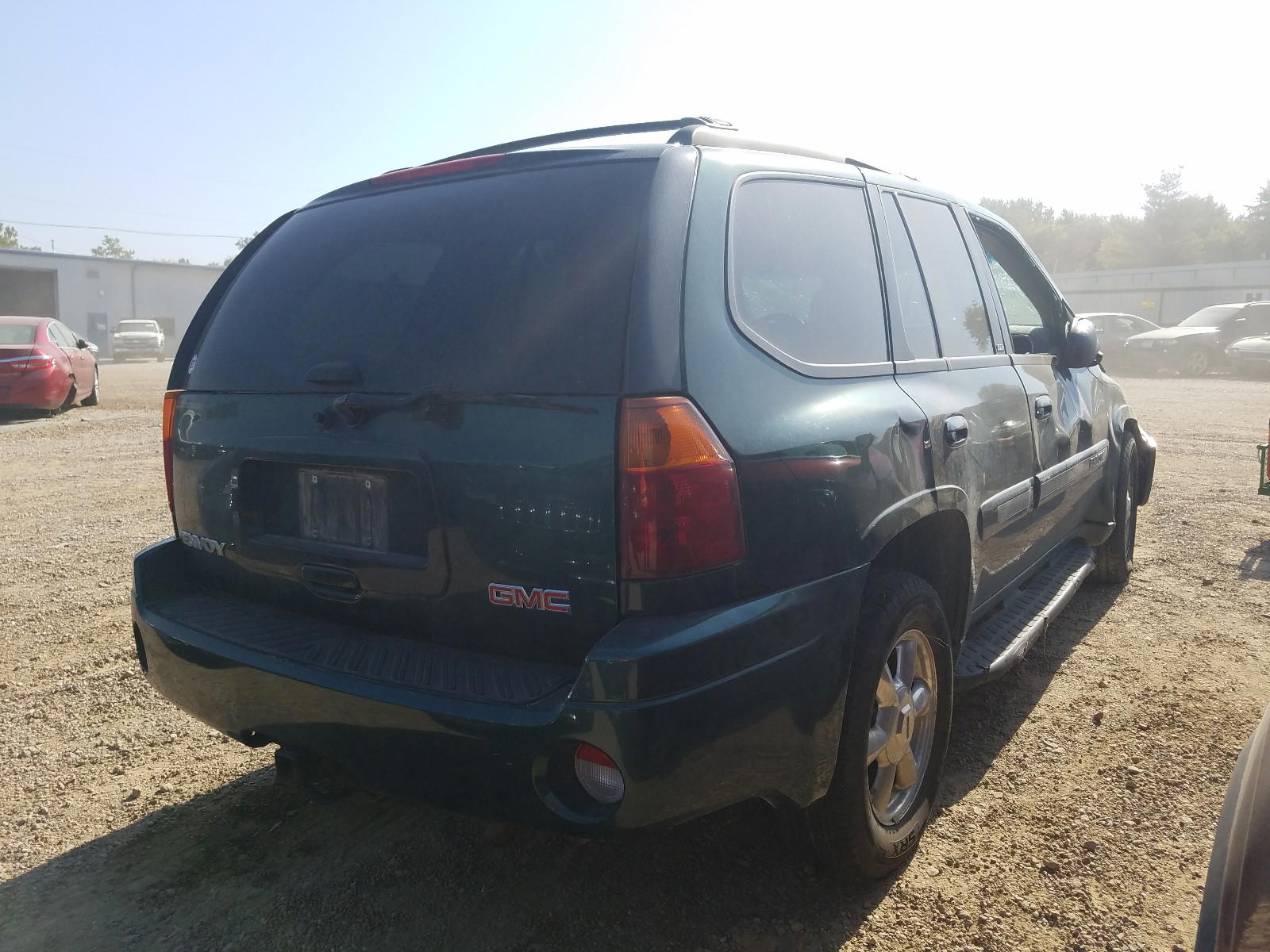 Photo 4 from auction – 2005 GMC ENVOY with VIN 1GKDT13S152329012
