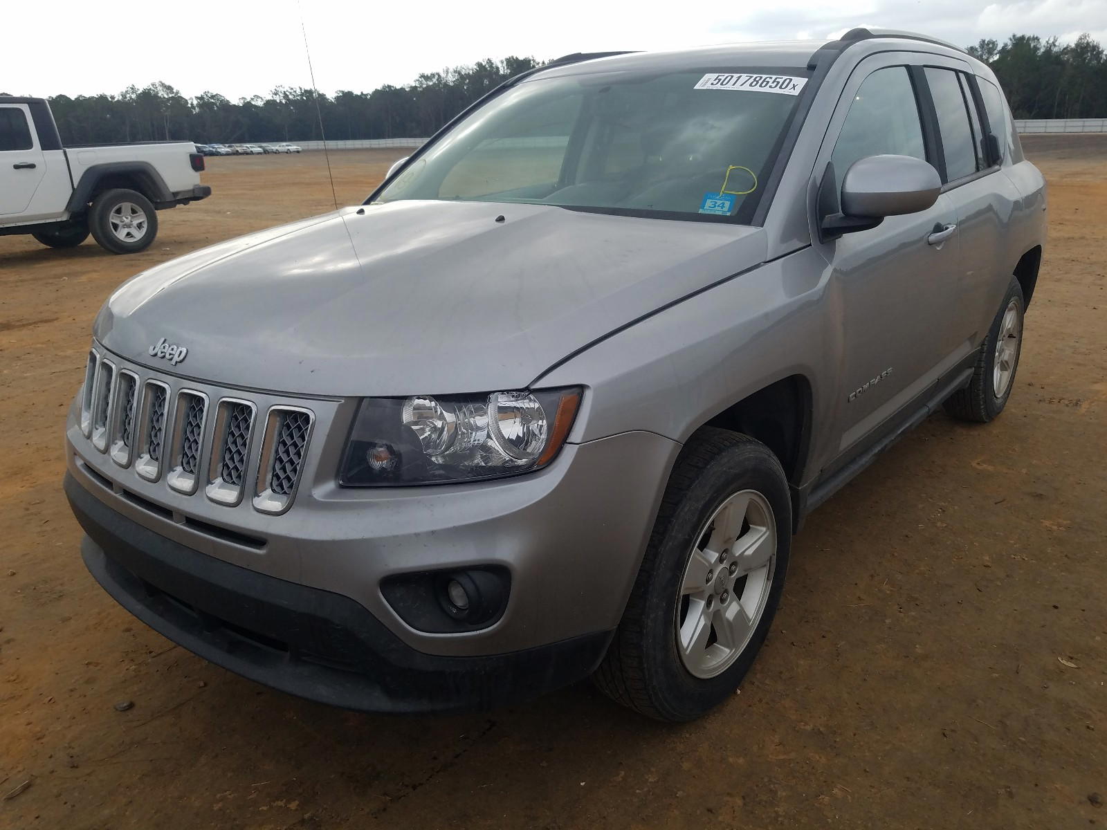Photo 2 from auction – 2016 JEEP COMPASS LA with VIN 1C4NJCEA1GD773908