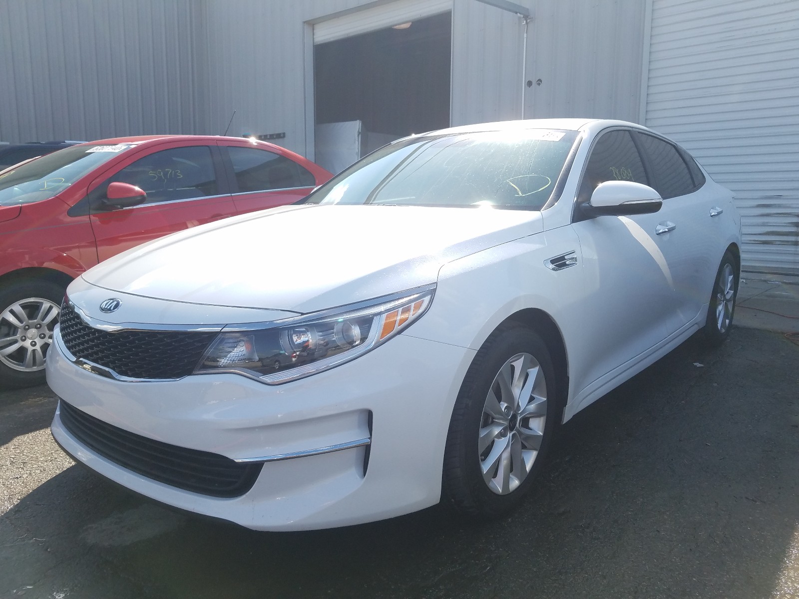 Photo 2 from auction – 2018 KIA OPTIMA LX with VIN 5XXGT4L30JG263284