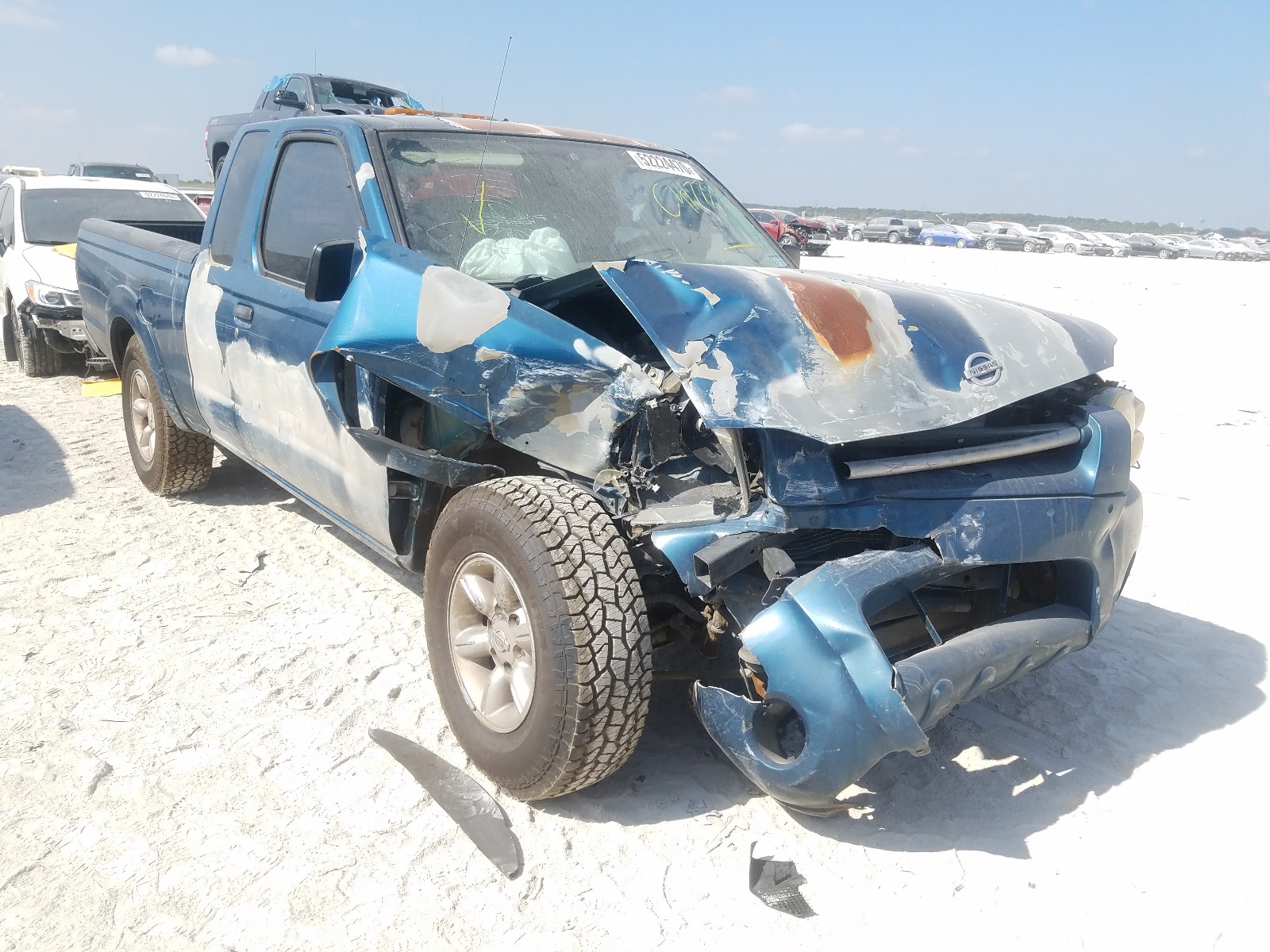 Photo 9 from auction – 2003 NISSAN FRONTIER K with VIN 1N6DD26T83C417773