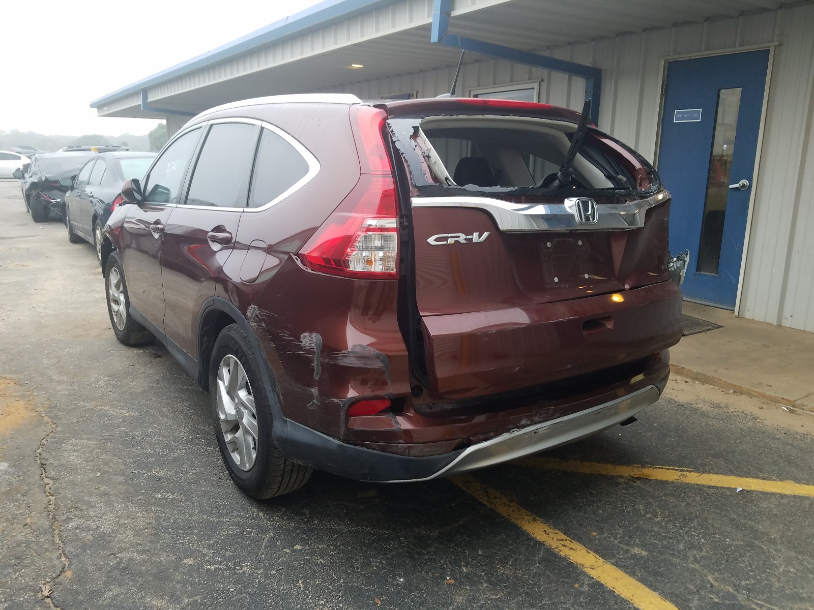 Photo 3 from auction – 2015 HONDA CR-V EXL with VIN 2HKRM3H76FH510623
