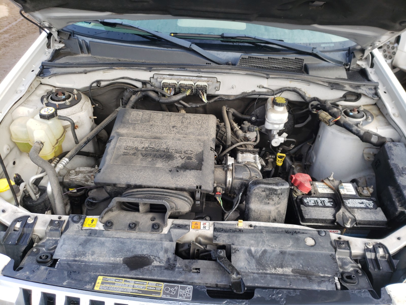Photo 7 from auction – 2010 MERCURY MARINER with VIN 4M2CN9BG9AKJ17329