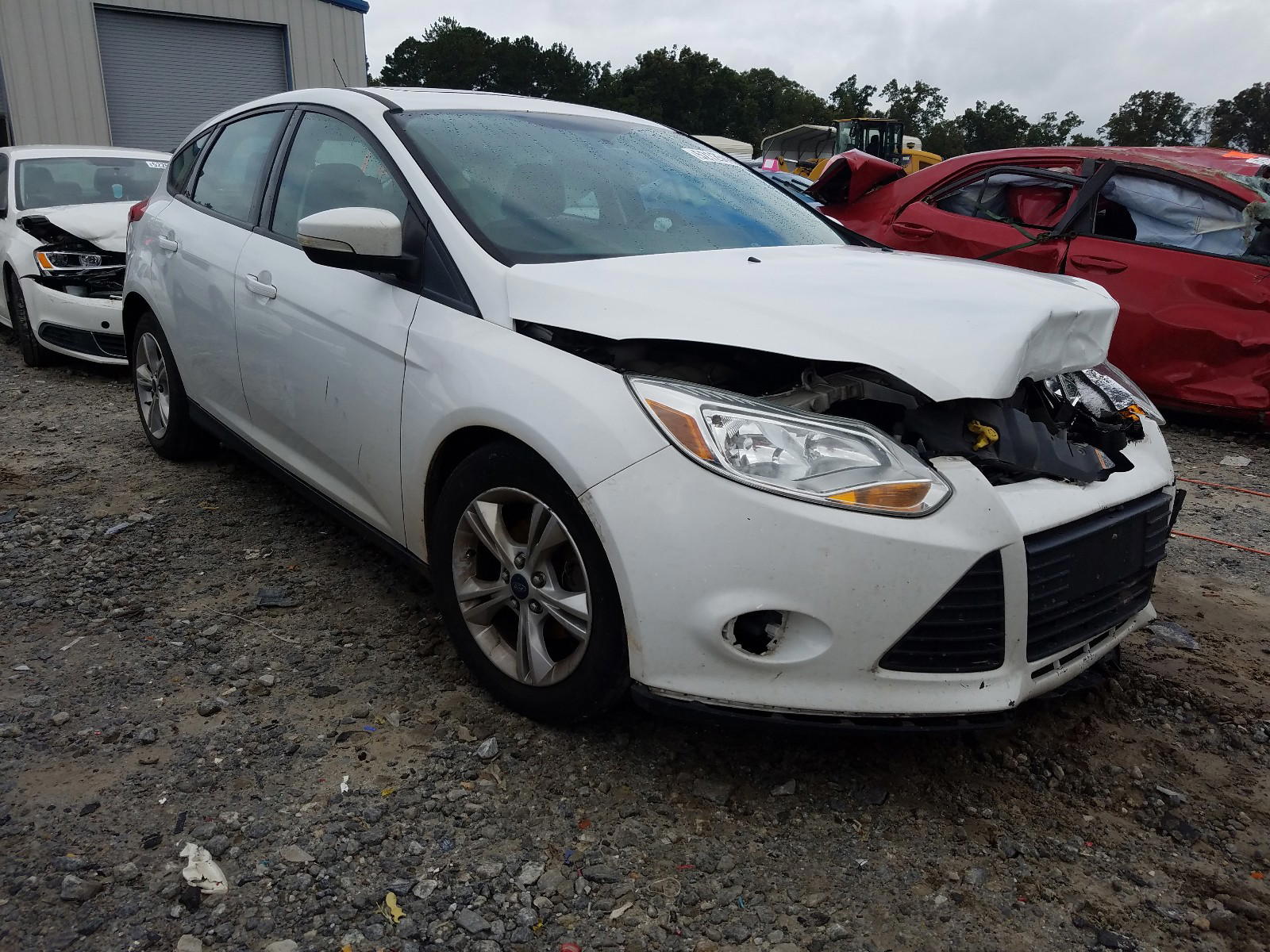 FORD FOCUS SE 2014 with VIN 1FADP3K29EL322791 - Photo from auction