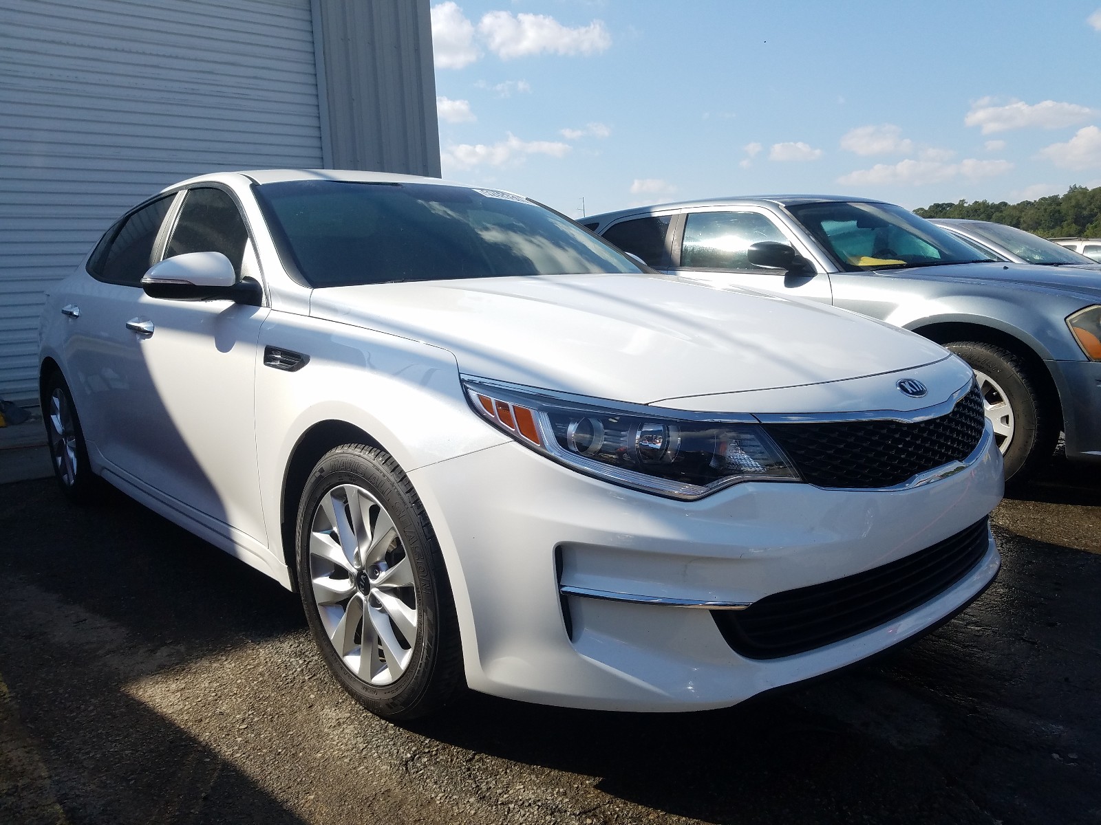Photo 1 from auction – 2018 KIA OPTIMA LX with VIN 5XXGT4L30JG263284